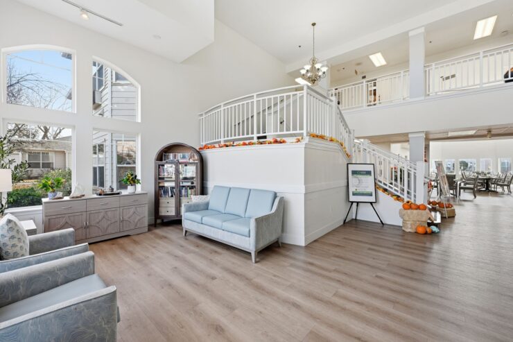 Bright and inviting, this communal space fosters connection and comfort. Natural light streams in, enhancing the warm atmosphere.