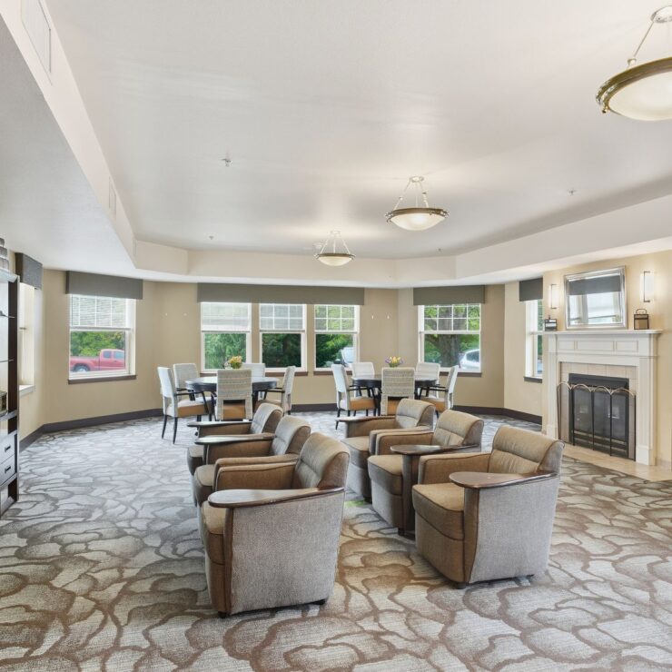 Bright, welcoming common area with comfortable seating, inviting natural light, and community engagement.