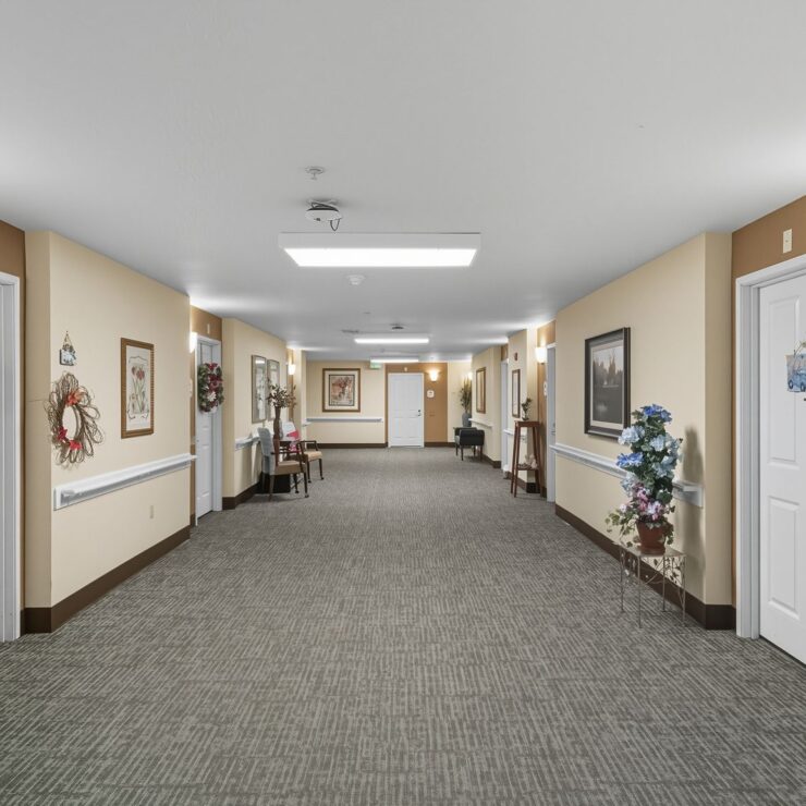 Welcoming hallway adorned with personal touches, fostering a sense of community and warmth.