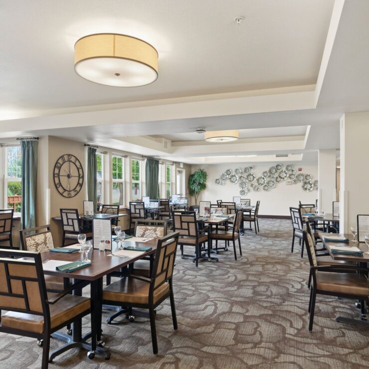 Bright and inviting dining area, fostering community and comfort for residents to enjoy meals together.