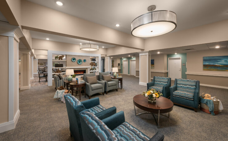 Inviting common area with comfortable seating, warm lighting, and a welcoming atmosphere for all.