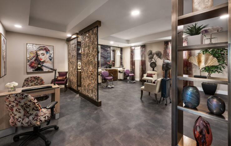 Bright and inviting, this salon space fosters community and relaxation, perfect for residents to connect.