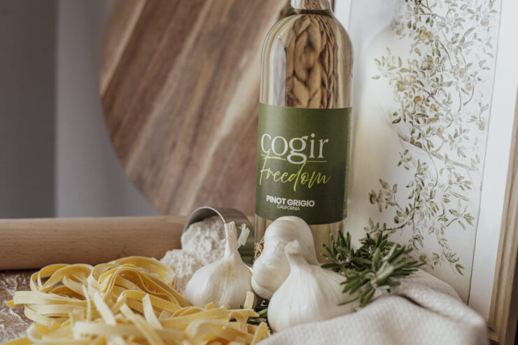 A warm kitchen scene filled with fresh ingredients, inviting community and shared moments over meals.