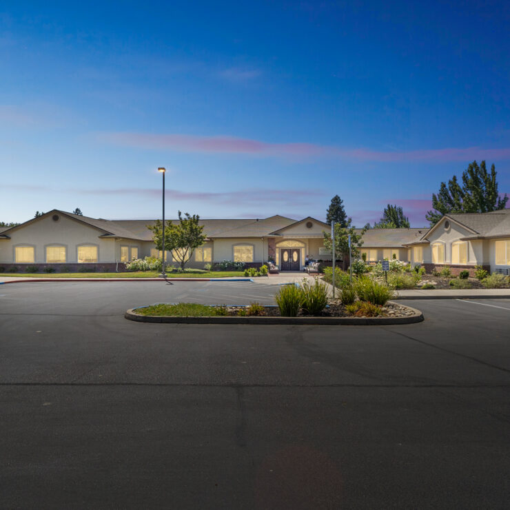 Welcoming grounds with well-maintained greenery, inviting residents to enjoy a peaceful community atmosphere.