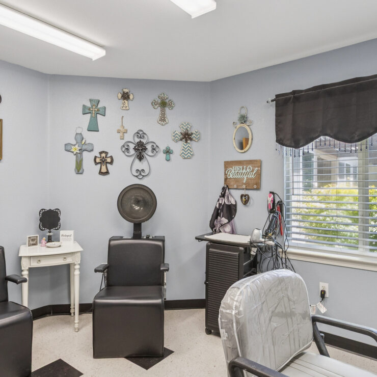 A welcoming salon space adorned with cheerful decor, inviting relaxation and community connections.