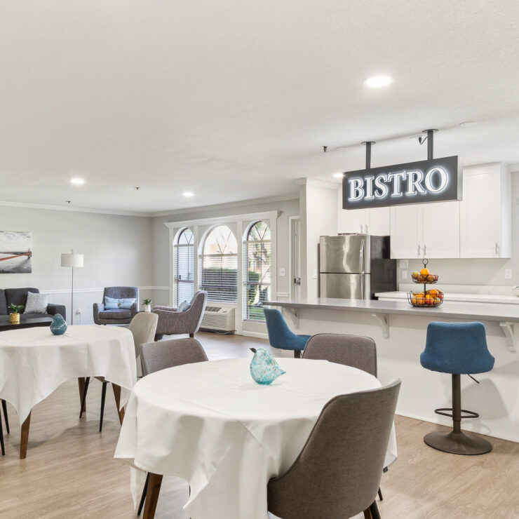 Bright and inviting bistro area, perfect for community gatherings and shared meals.
