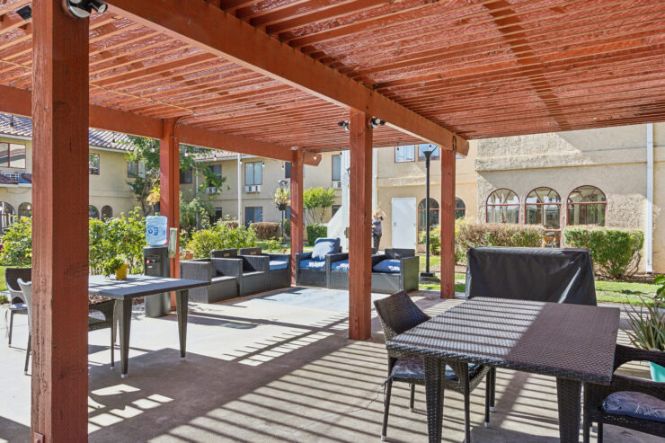Sunny outdoor space with inviting seating, perfect for community gatherings and relaxation.