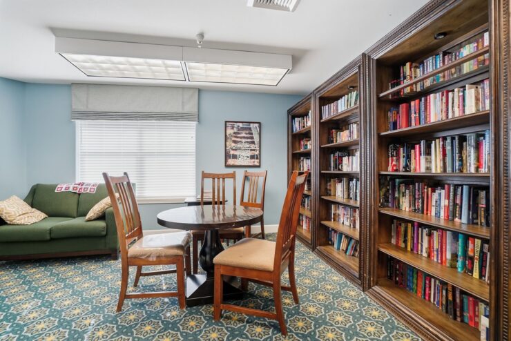 Inviting reading nook with comfortable seating and a warm atmosphere, perfect for community gatherings.