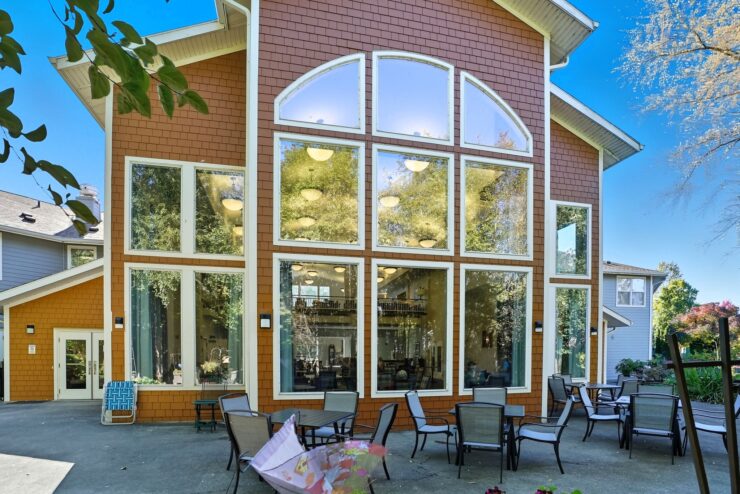 Bright, welcoming space with outdoor seating invites community connection and comfort.