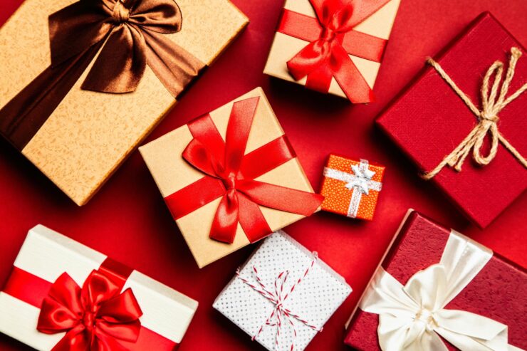 A vibrant array of beautifully wrapped gifts, symbolizing joy and community spirit, awaits celebration.