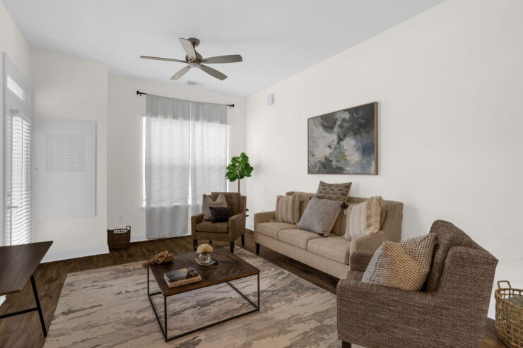 Bright and inviting, this community space offers comfort with stylish seating and warm decor.