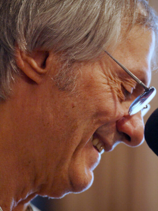 A joyful moment shared during an engaging event, highlighting connection and warmth in our community.