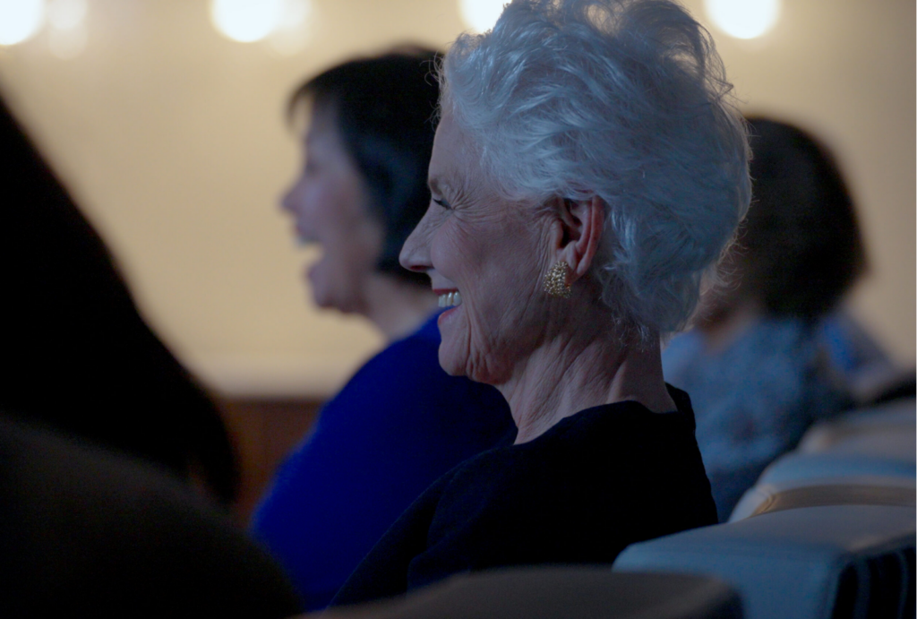 Residents enjoy a joyful moment together, sharing laughter and warmth in a welcoming atmosphere.