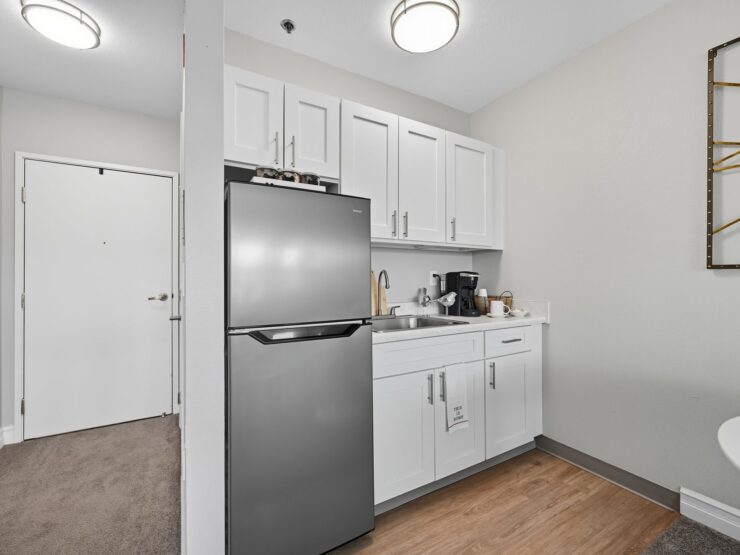 A welcoming kitchen space, blending modern comforts with a sense of community and warmth.
