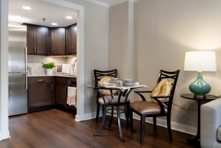 A welcoming dining area features elegant furnishings, inviting warmth and a sense of community.