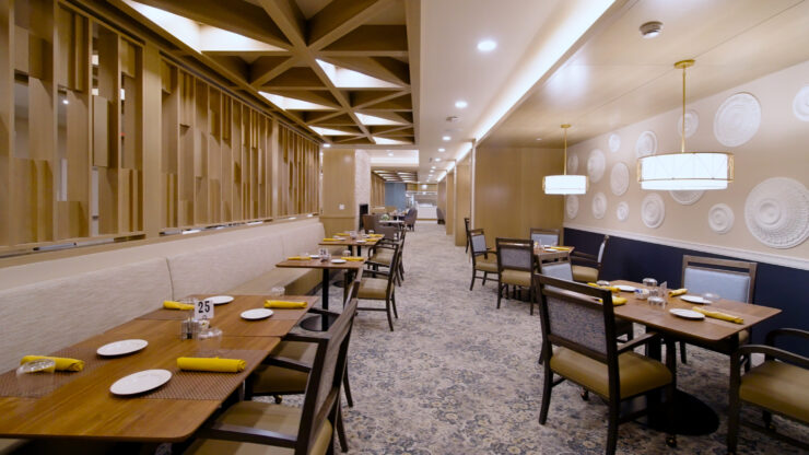Welcoming dining space designed for community gatherings, featuring elegant decor and ample seating.