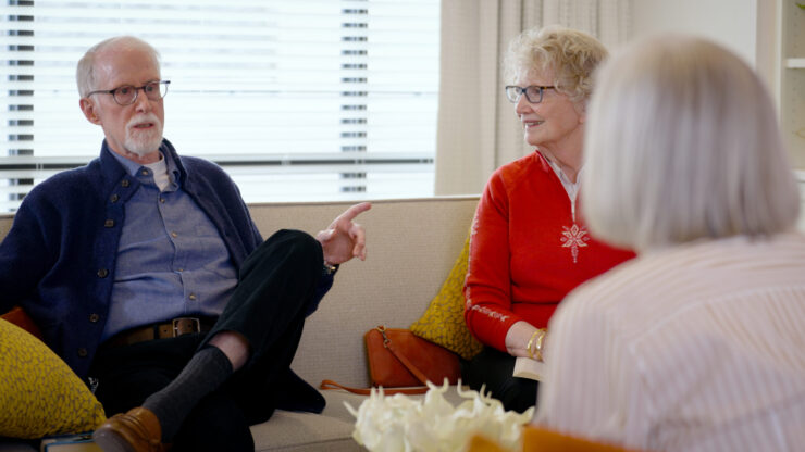 Engaging conversations among friends create a warm, inviting atmosphere in a welcoming community space.