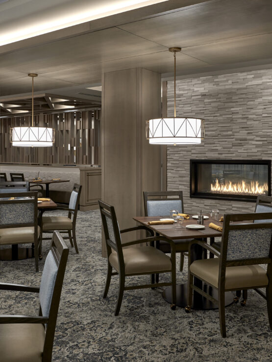 Inviting dining area with warm lighting, elegant decor, and a welcoming atmosphere for community gatherings.