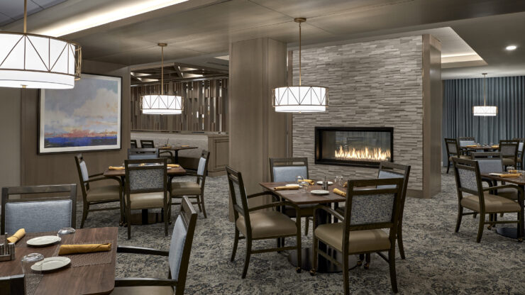 Inviting dining area with warm lighting, elegant decor, and a welcoming atmosphere for community gatherings.
