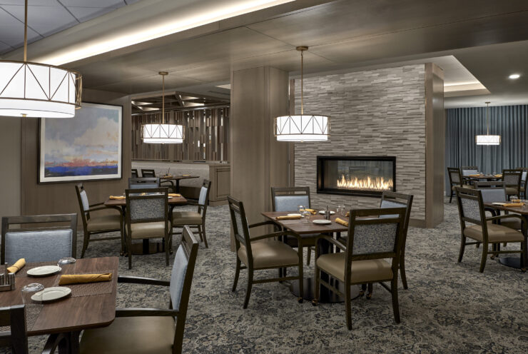 Inviting dining area with warm lighting, elegant decor, and a welcoming atmosphere for community gatherings.