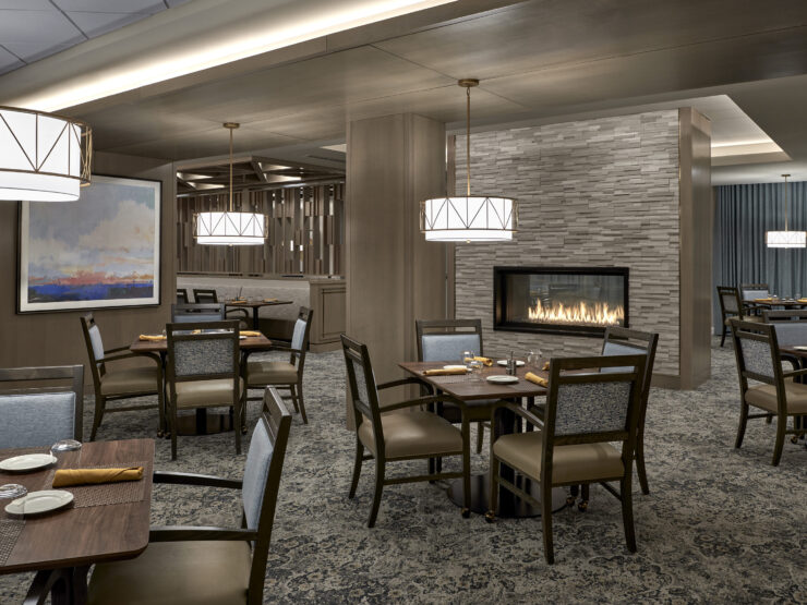 Inviting dining area with warm lighting, elegant decor, and a welcoming atmosphere for community gatherings.