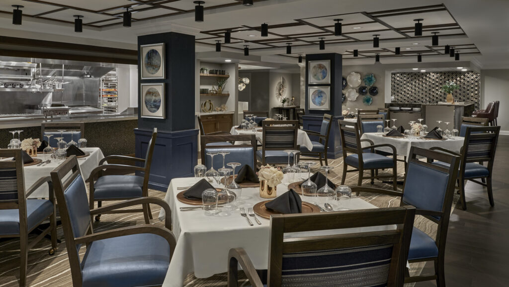 Elegant dining space designed for community gatherings, featuring warm decor and inviting ambiance.