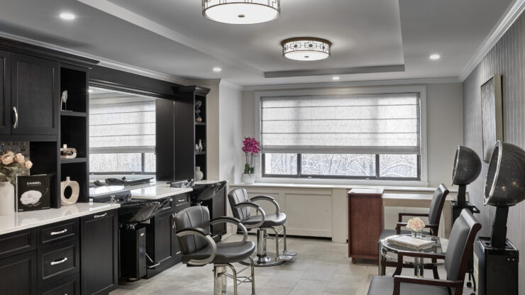 A serene salon space featuring elegant decor, inviting chairs, and natural light, fostering community and relaxation.