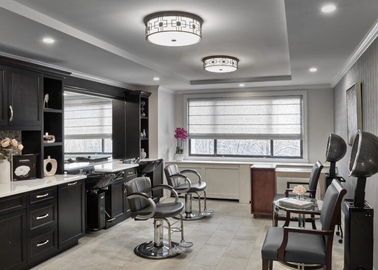 A serene salon space featuring elegant decor, inviting chairs, and natural light, fostering community and relaxation.