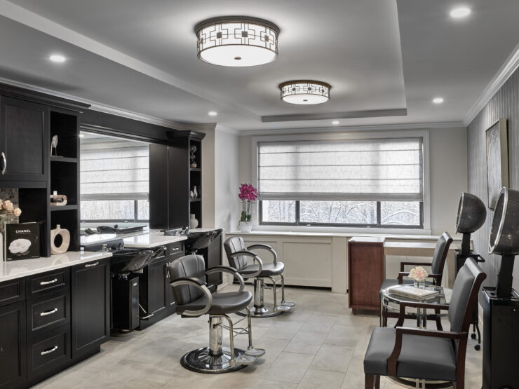 A serene salon space featuring elegant decor, inviting chairs, and natural light, fostering community and relaxation.