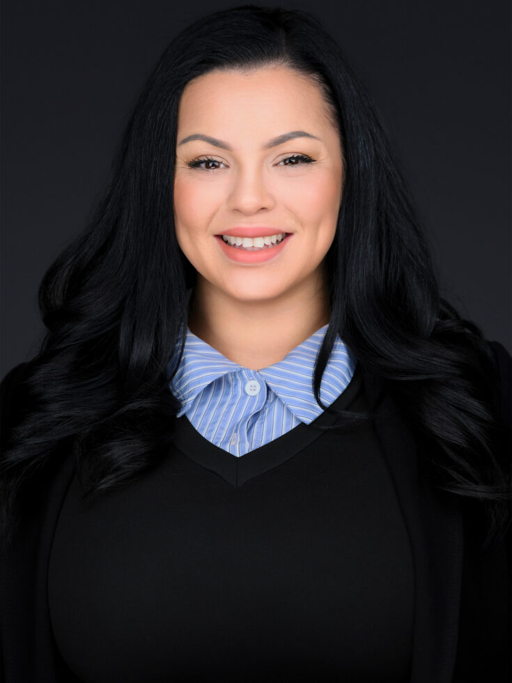 A warm smile radiates approachability, inviting a sense of community and care.