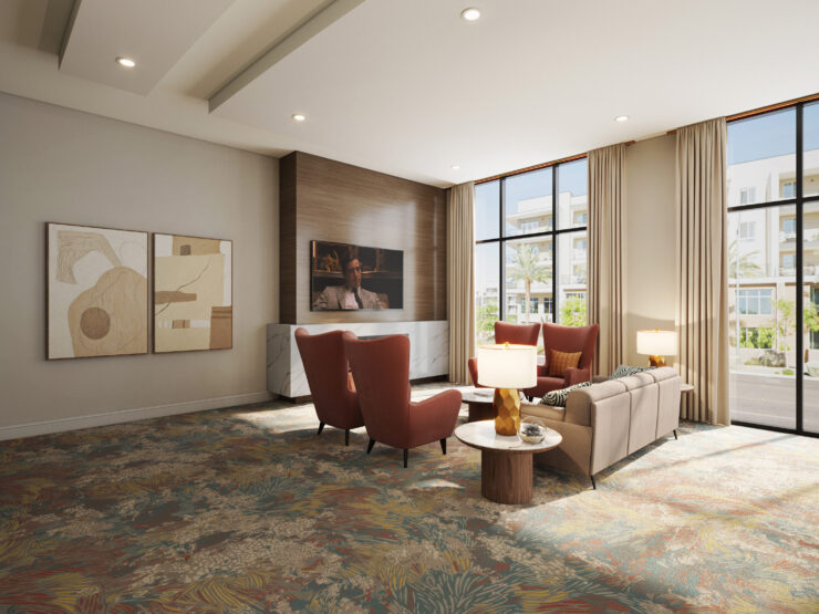 A bright, inviting lounge features comfortable seating, warm lighting, and vibrant decor, fostering community.