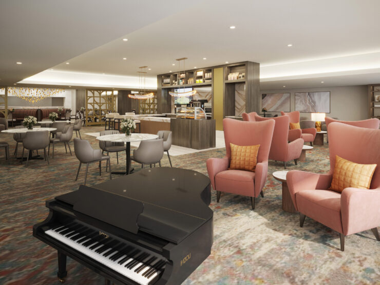 A welcoming lounge with elegant seating, a piano, and bright decor fosters community and comfort.