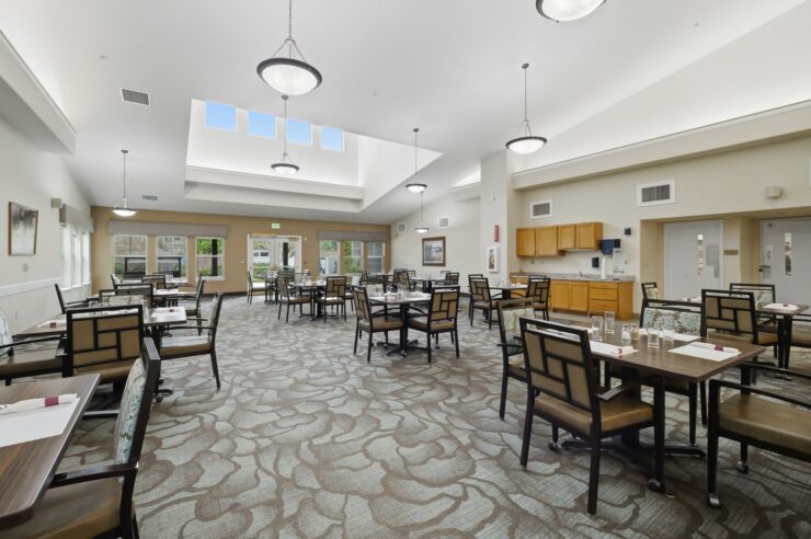 Bright and spacious dining area inviting residents to gather for meals and companionship.