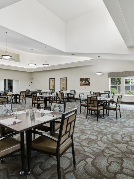 Bright and inviting dining area, fostering community and comfort with spacious seating and natural light.