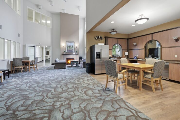 Bright and inviting common area, featuring comfortable seating and a warm atmosphere for community gatherings.