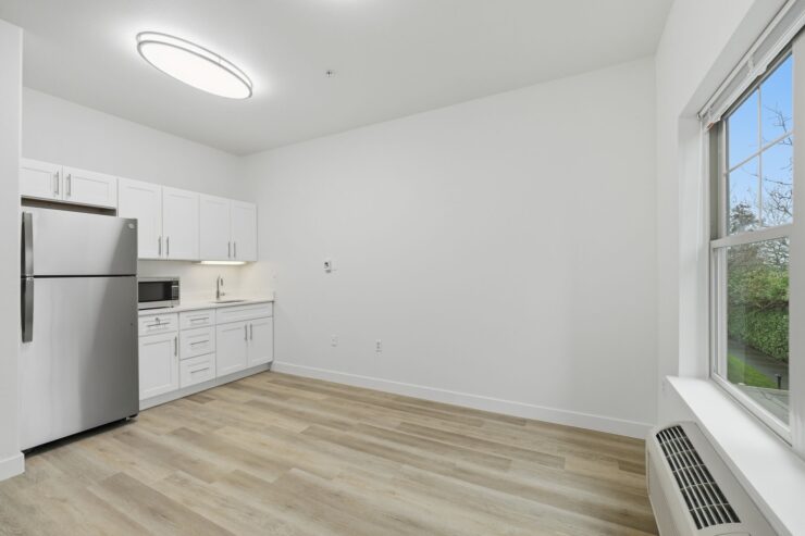 Bright and inviting kitchen space, perfect for creating meals and sharing moments in community.