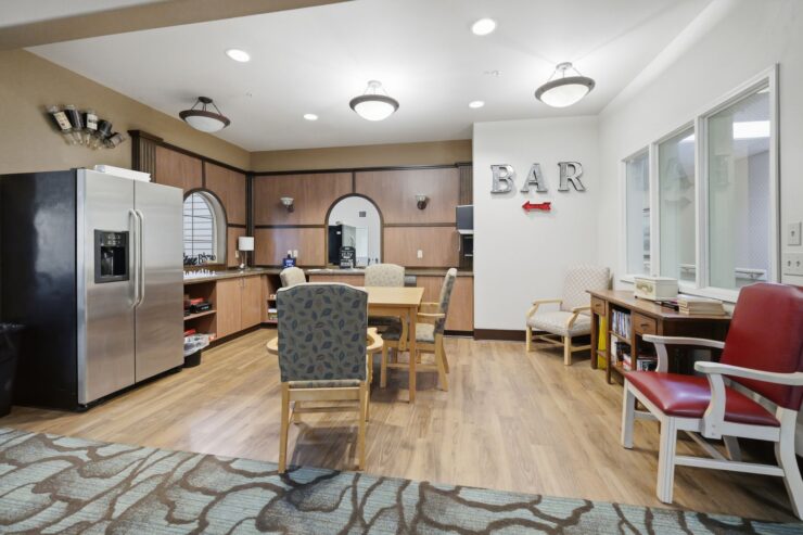 A welcoming lounge with a bar area, inviting seating, and a warm, friendly atmosphere for socializing.