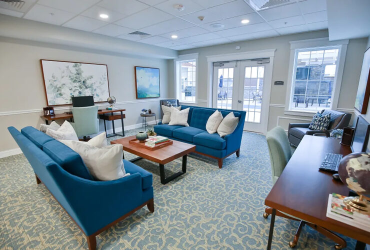 Bright and inviting, this communal space features comfortable seating, fostering connection and warmth.
