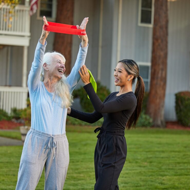 Laughter and joy fill the air as residents engage in uplifting activities in a welcoming garden.