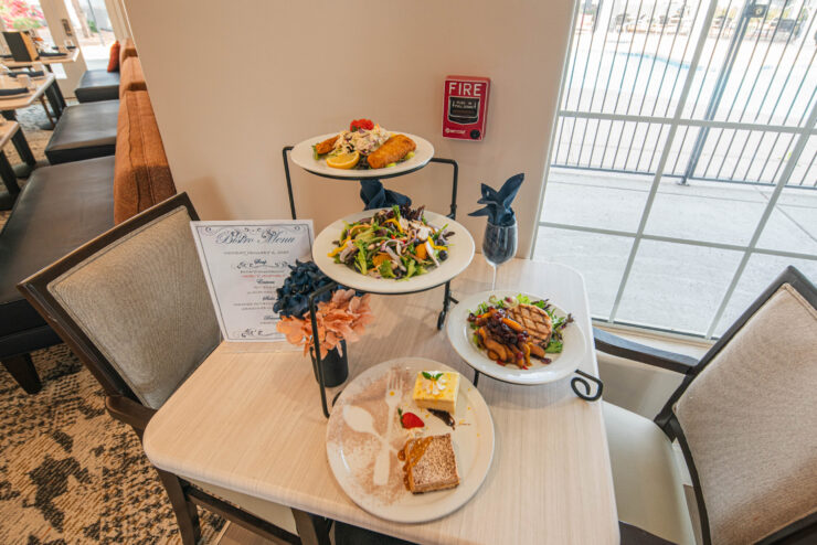 A welcoming dining area showcases delicious meals, fostering community and comfort among residents.