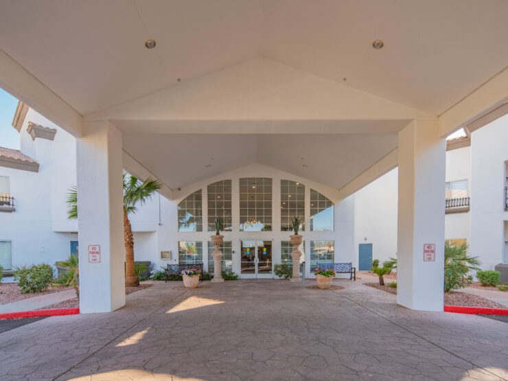 Welcome to a vibrant community entrance, inviting warmth and connection among residents and visitors.