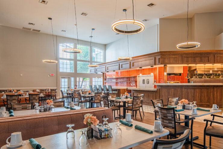 Bright and inviting dining area, fostering community with cheerful decor and ample seating.