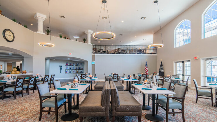 Bright, inviting dining area filled with comfortable seating, fostering community and connection.