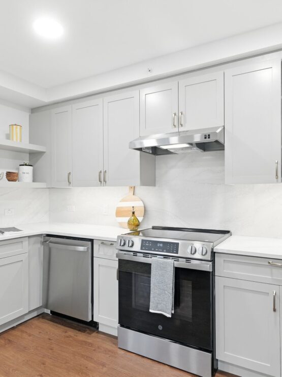 Bright, modern kitchen with ample storage and stainless steel appliances, inviting comfortable living.