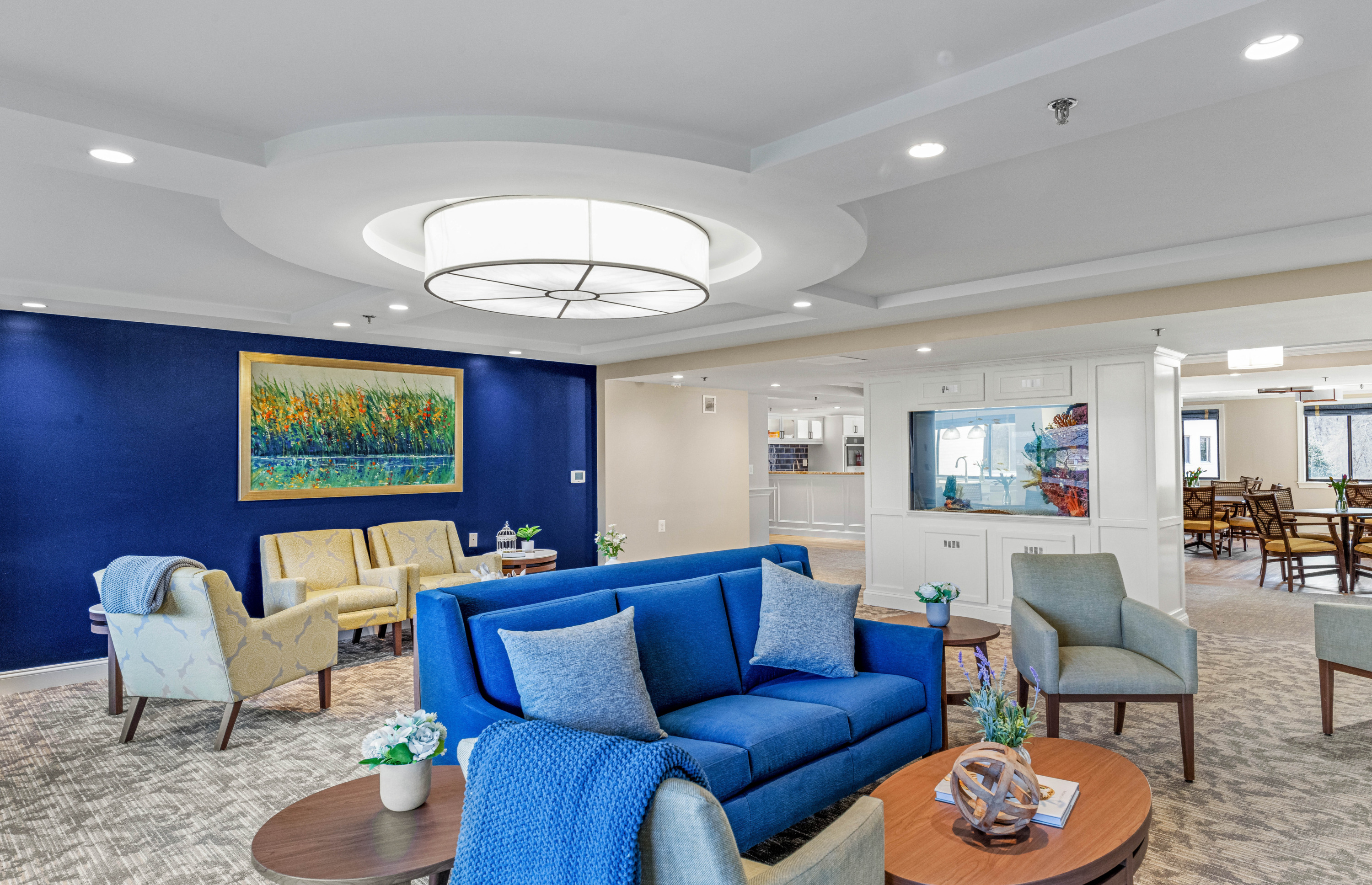 Bright and inviting lounge with comfortable seating and a vibrant community atmosphere.