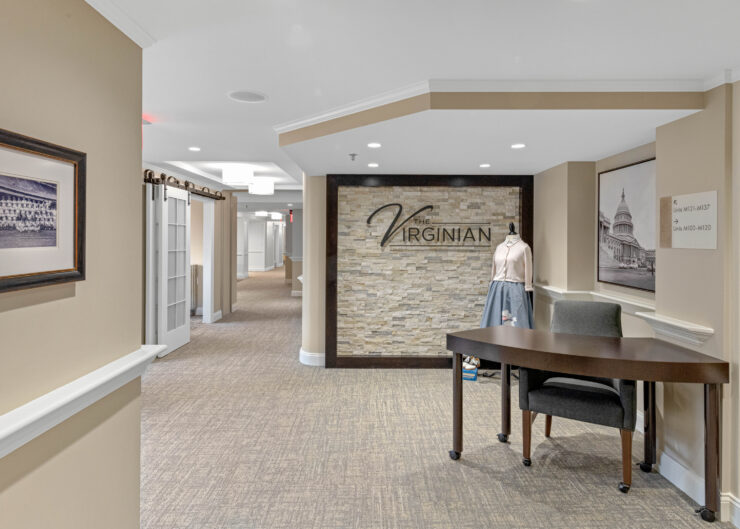 Welcoming lobby with comfortable seating and warm lighting at The Virginian retirement community