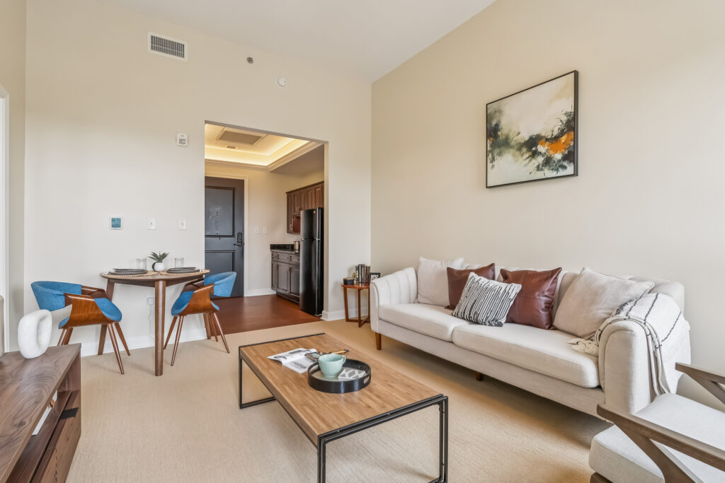 Warm living area with plush seating, modern dining nook, and inviting décor for relaxation.