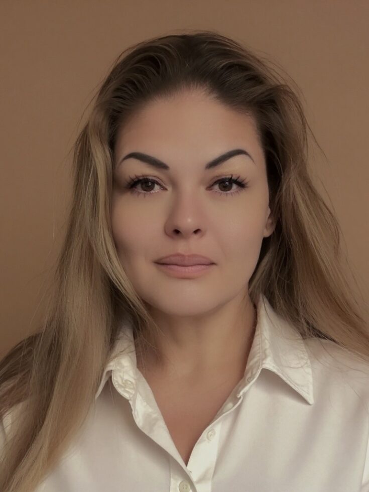 A warm and welcoming woman exuding calm and kindness, fostering a sense of community.
