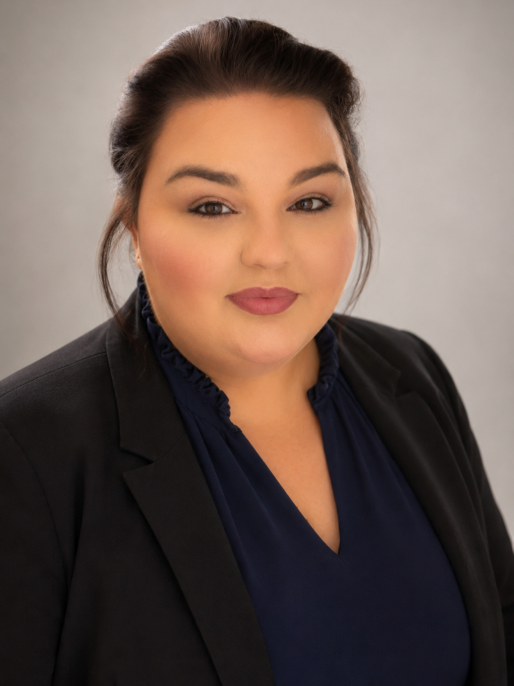 Friendly professional woman with a warm smile, embodying trust and care.