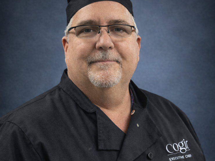 Experienced executive chef in a welcoming setting, dedicated to nourishing community members.